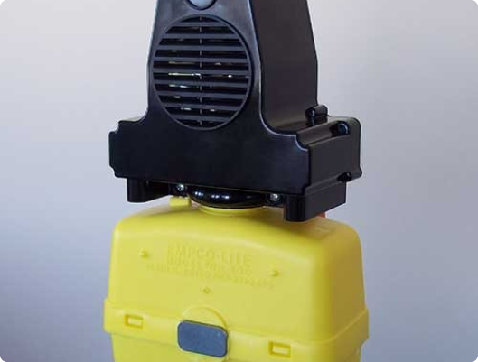 a black and yellow plastic container with a black vent