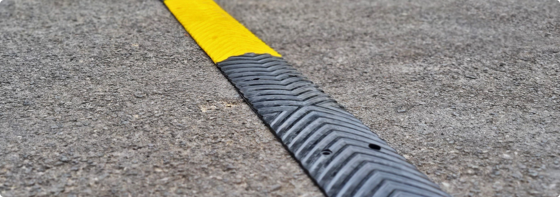 a close-up of a yellow and black curb